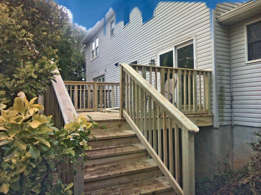 Wood deck with stairs and matching railing