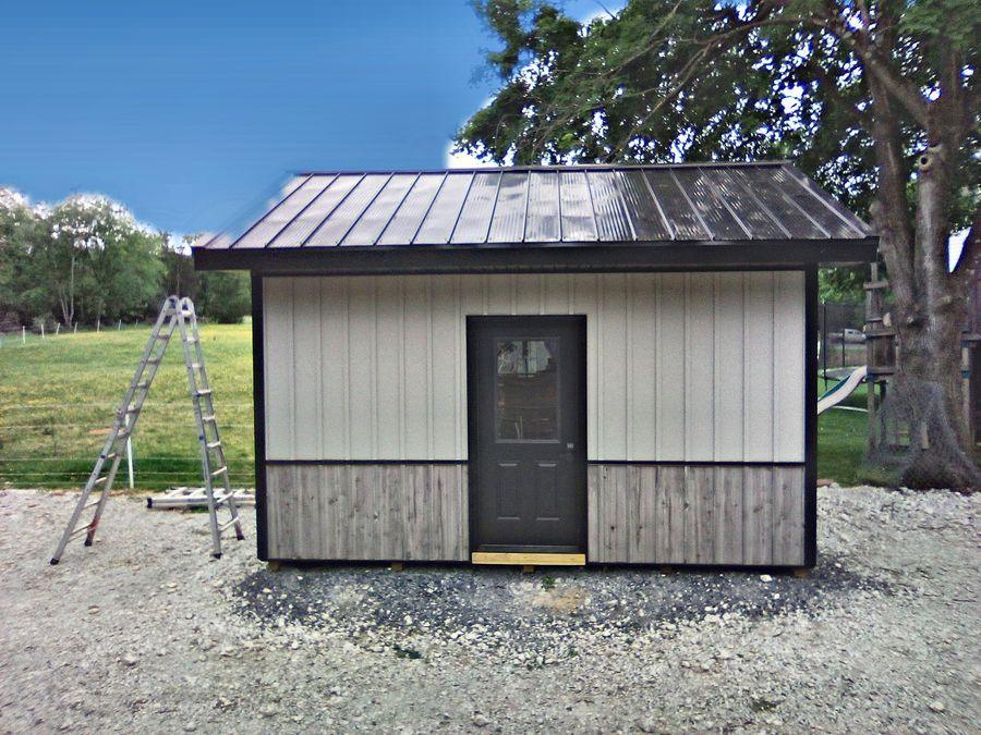 Board-and-batten outbuilding, standing seam roof